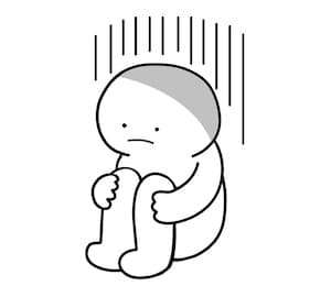 言いたいことが言えず、一人で膝を抱えて落ち込んでいる人のイラスト
